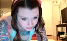 Tattooed Cutie Playing With Glass Dildo