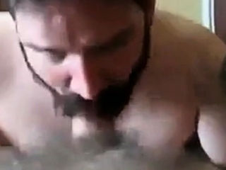 Bearded daddy sucks big hairy cock