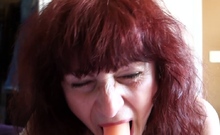 Redhead Mature Has Fun With A Dildo