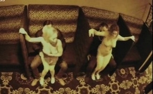 Strippers dance in the semi private room