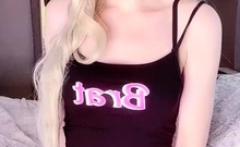 Blonde teen in solo action with her pussy